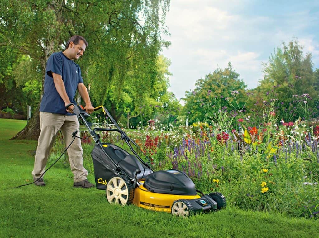 man mowing