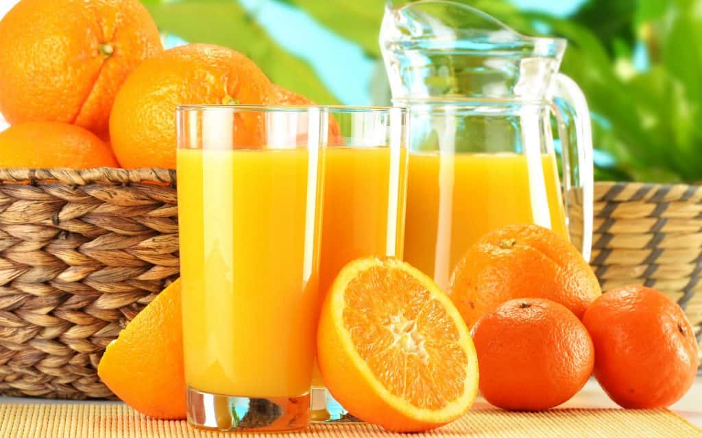 orange fruits and juices