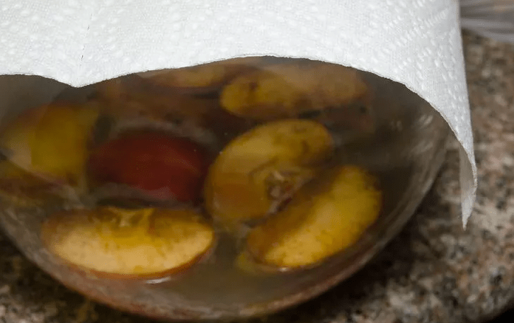 apples in jar with cloth