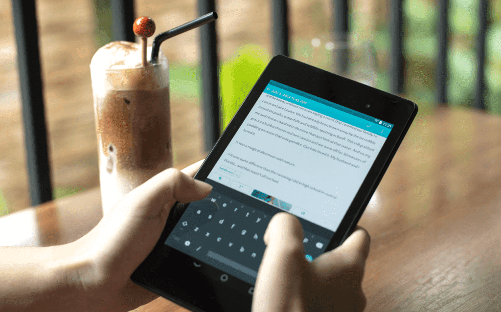 writing a journal in a smartphone