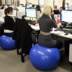 people uses exercise balls as office chair