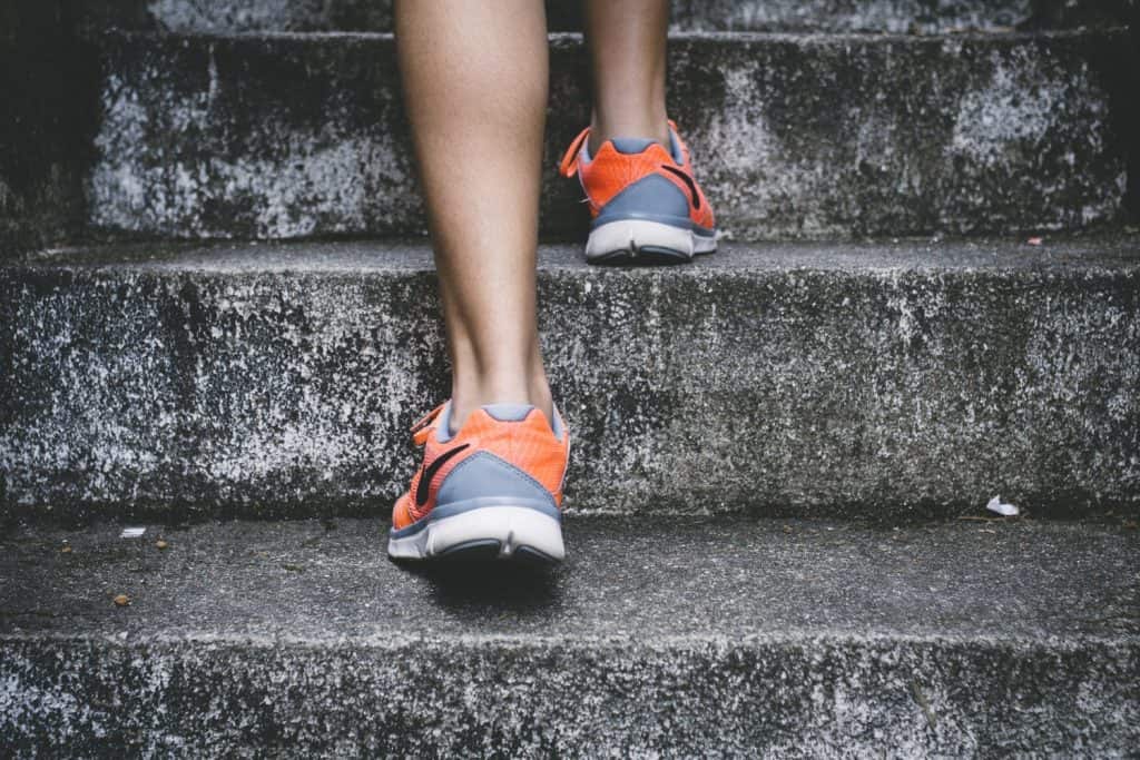 a person taking a walk in the stairs