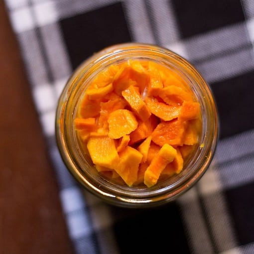 a jar of turmeric and ginger pickles