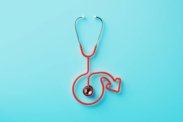 Red stethoscope forming erectile dysfunction symbol on blue background. Sexual health concept.