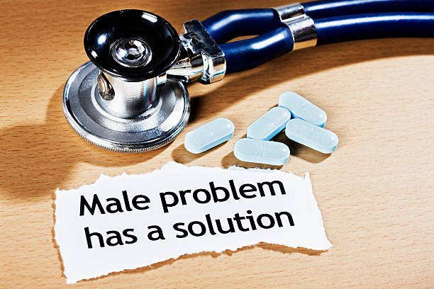 A press headline announcing a solution to erectile dysfunction with a stethoscope and some of those famous anti-impotence blue pills resting on a wooden desk.