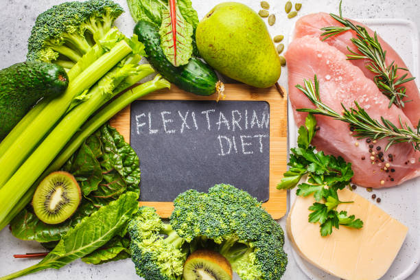 Flexitarian diet background concept, top view. Vegetables, fruits, meat and cheese - a healthy diet.