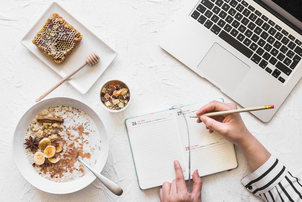 Healthy morning routine with stretching water and daily planner